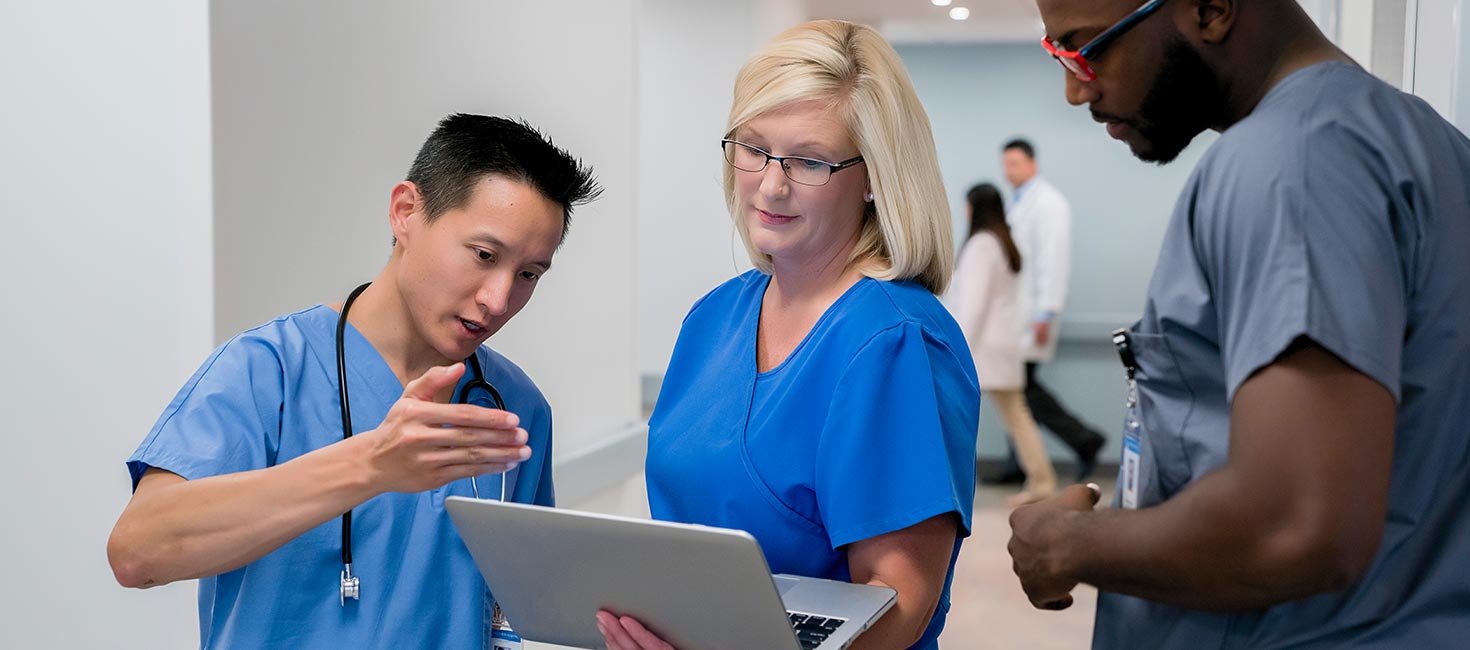 Nurses consulting on patient care