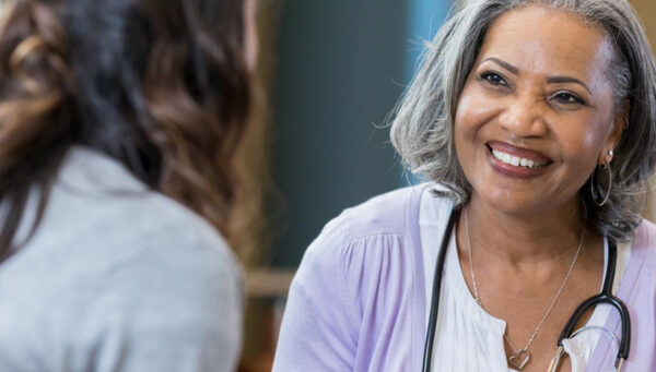 Nurse mentoring a younger colleague