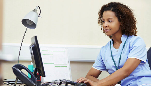Nurse working on computer